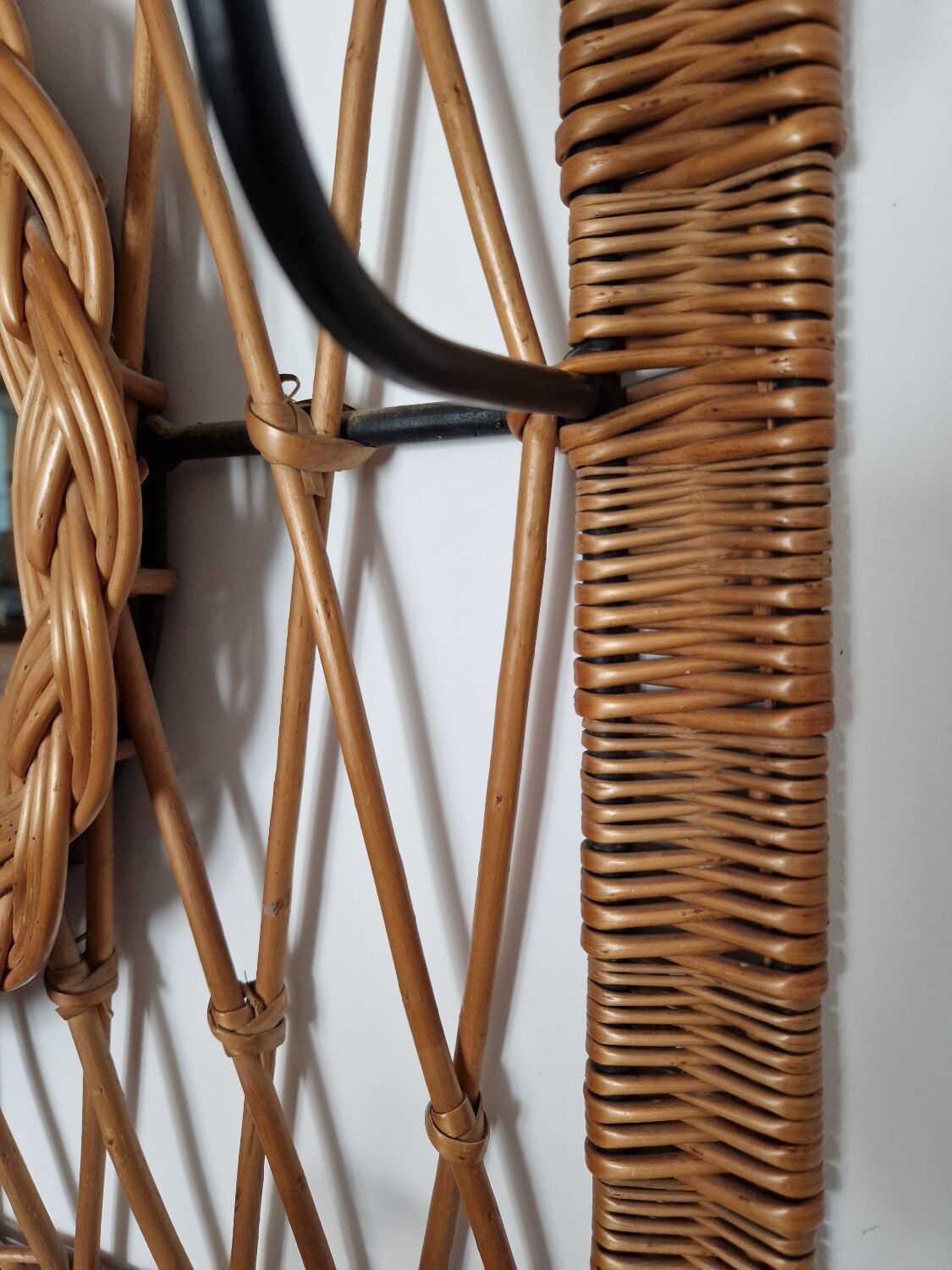Woven wicker coat rack
