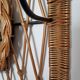 Woven wicker coat rack