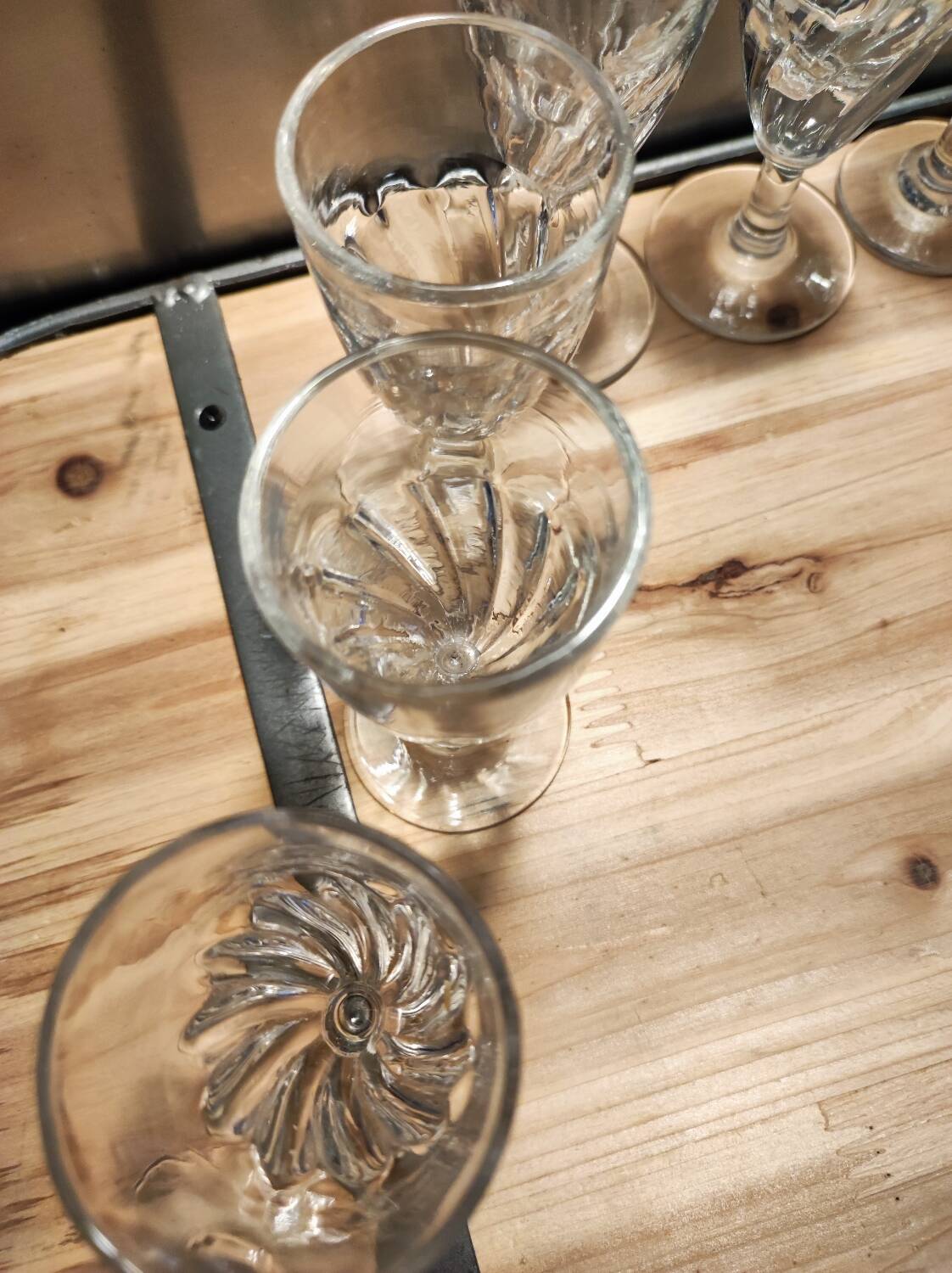 12 small twisted bistro glasses, 19th century