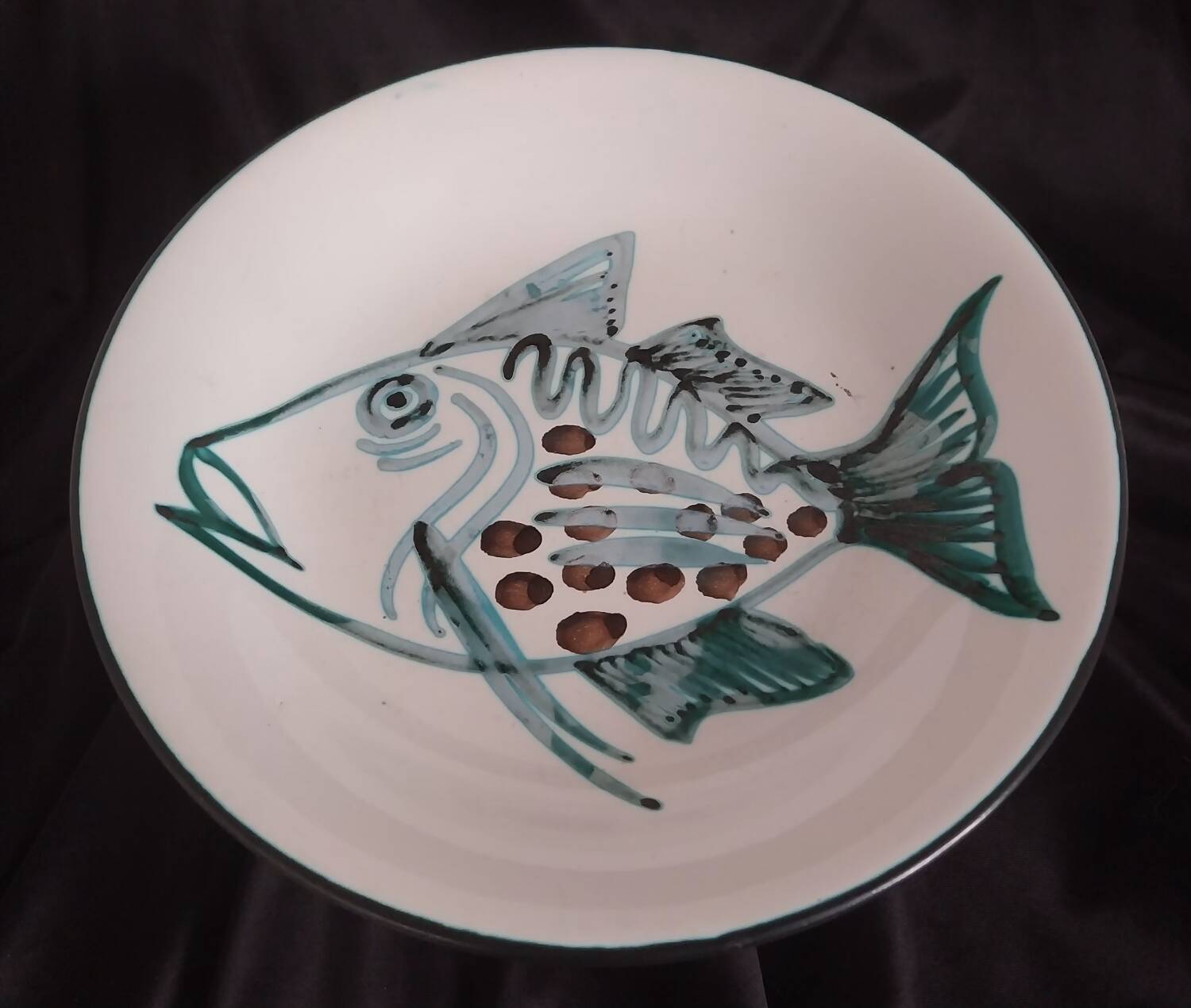 Assiette creuse à décor de poisson R.Picault