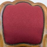 Vintage captain's chair in wood and garnet fabric — a seat with character