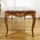 Table basse de style Louis XV en bois doré dessus marbre