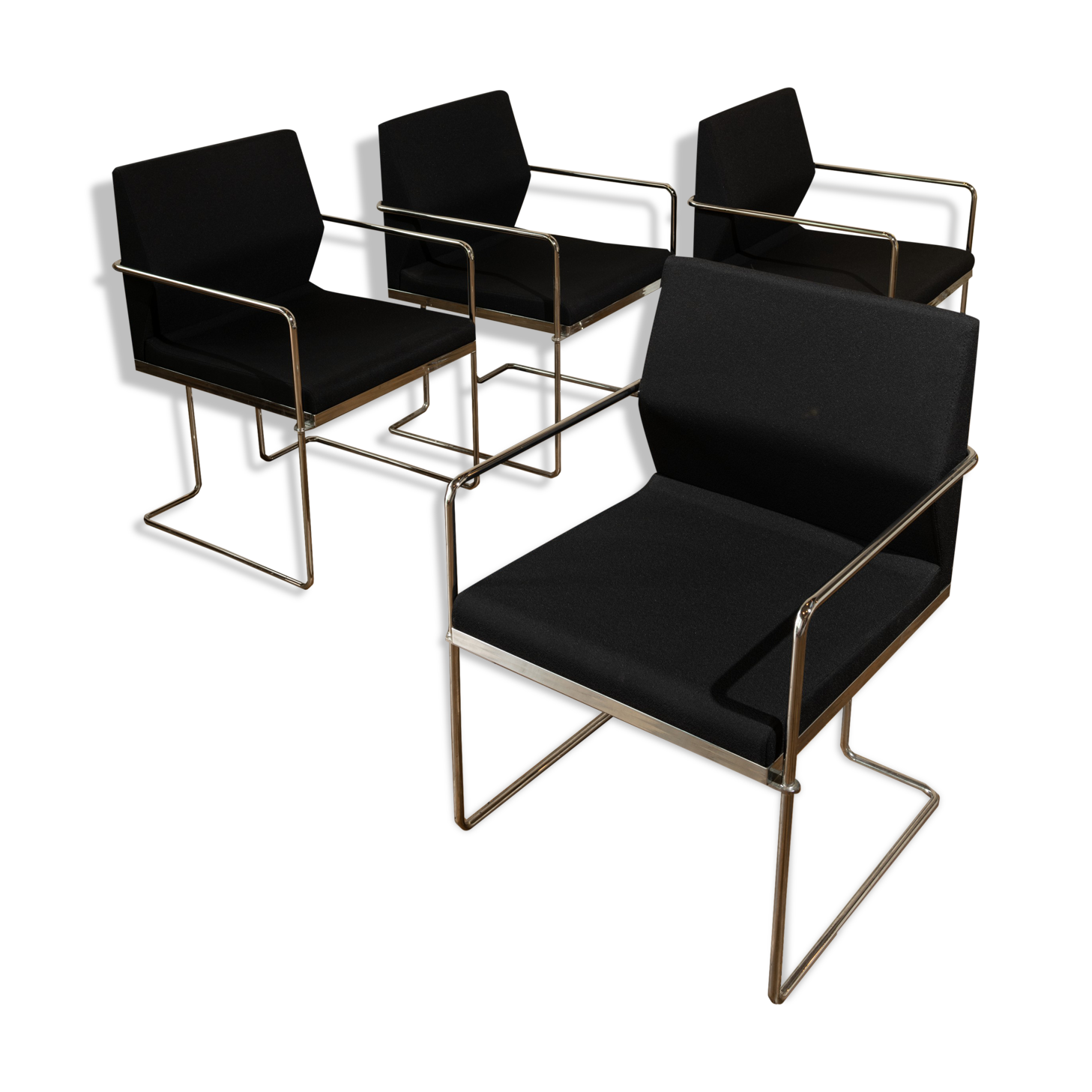 Four armchairs in tubular metal and black fabric 1990