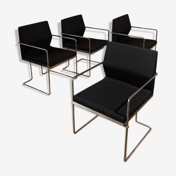 Four armchairs in tubular metal and black fabric 1990