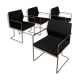 Four armchairs in tubular metal and black fabric 1990