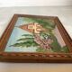 Small painting of a flowered house in oil on cardboard.