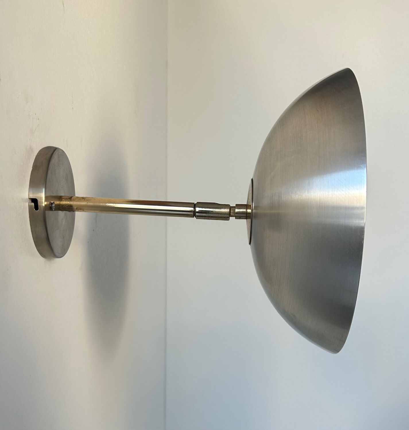 Vintage adjustable brushed metal and brass wall light, France 1970