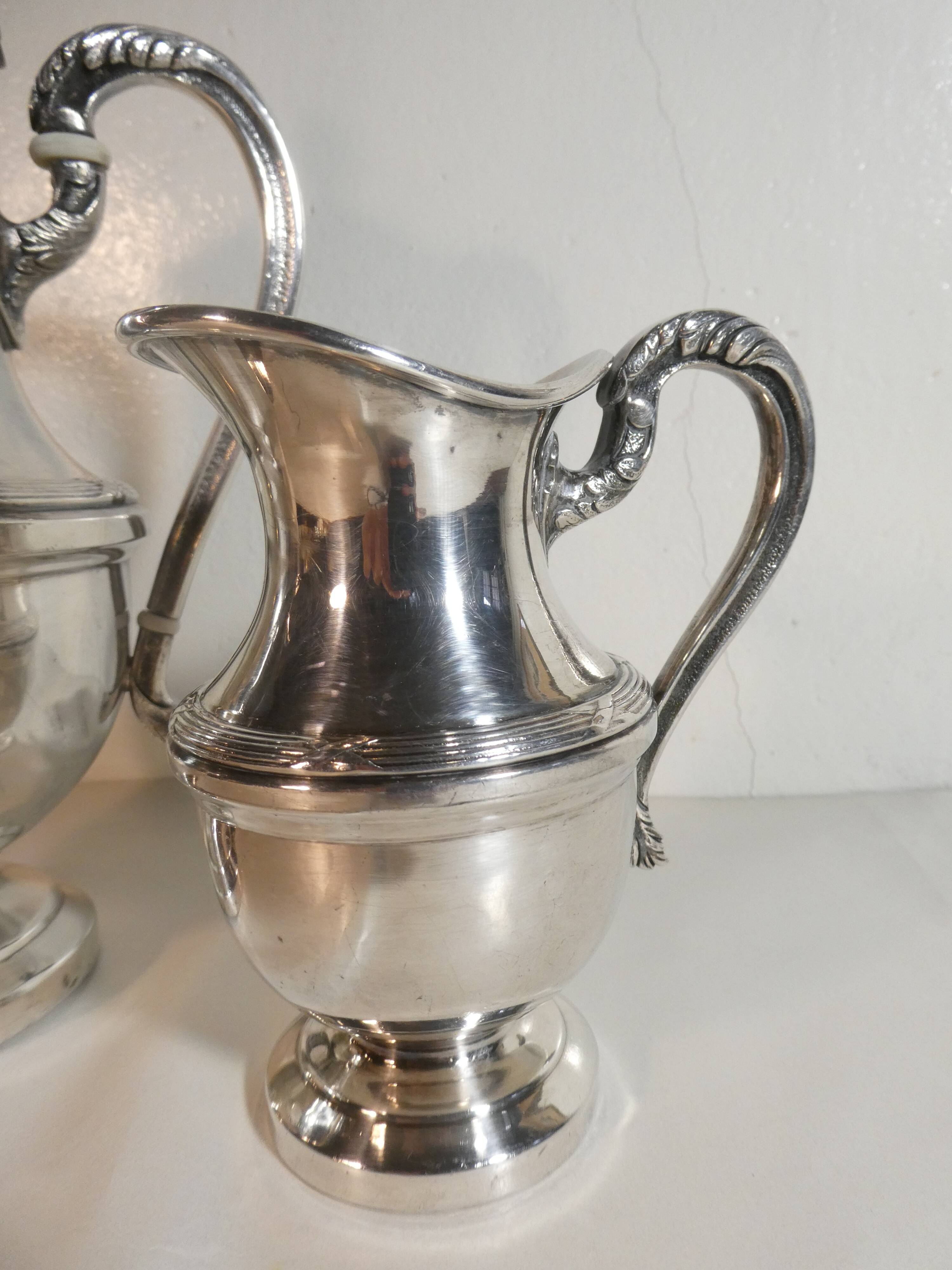 Louis XVI style silver-plated teapot and milk jug