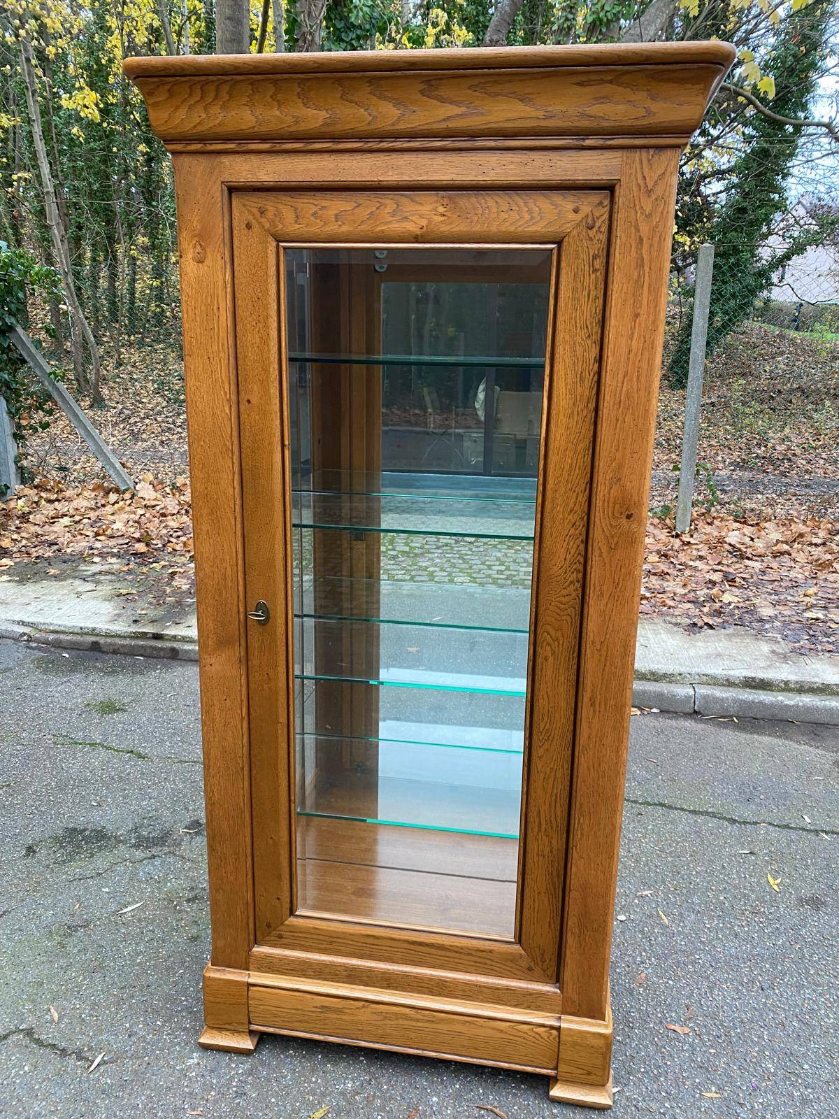 Louis Philippe illuminated display cabinet in solid oak from the 20th century