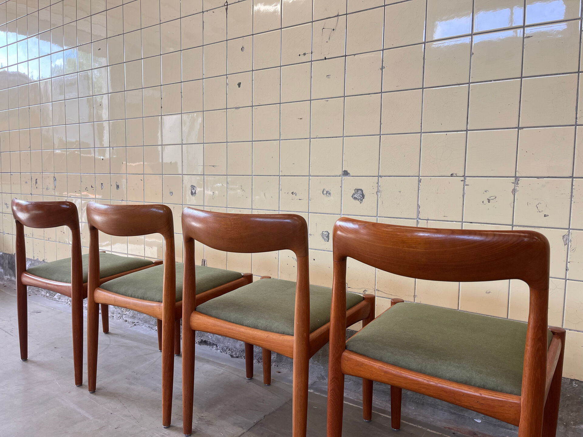 Set of four vintage solid teak dining chairs