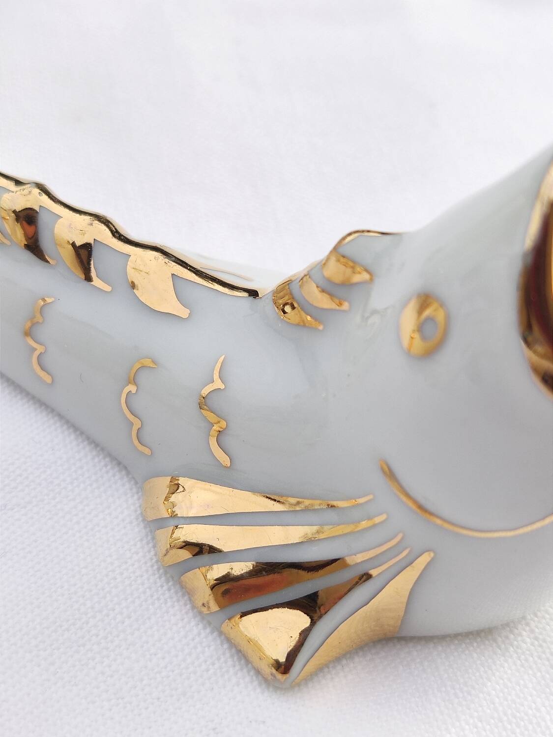White and gold Limoges porcelain knife rests - animal motif: fish