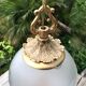 Floral globe and gold metal hanging lamp