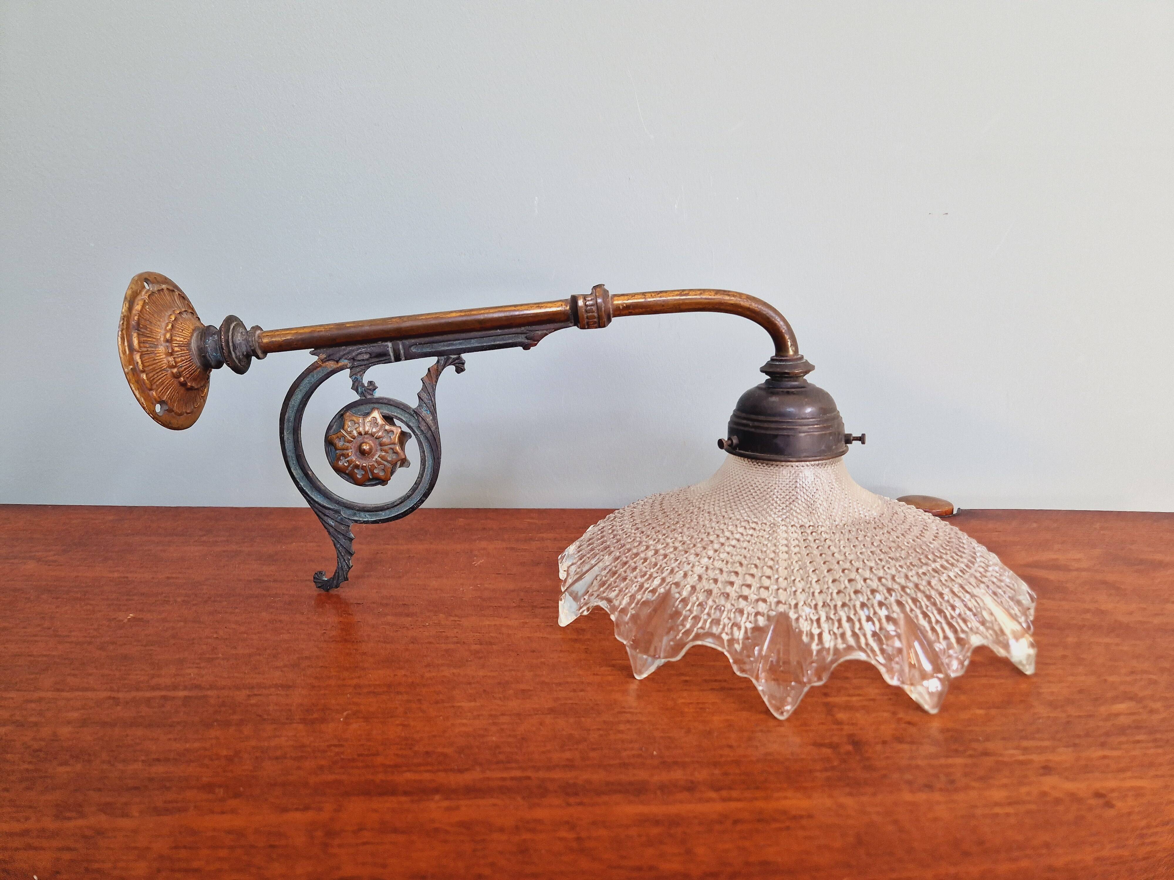 Pair of pendant lights in bronze and scalloped transparent glass