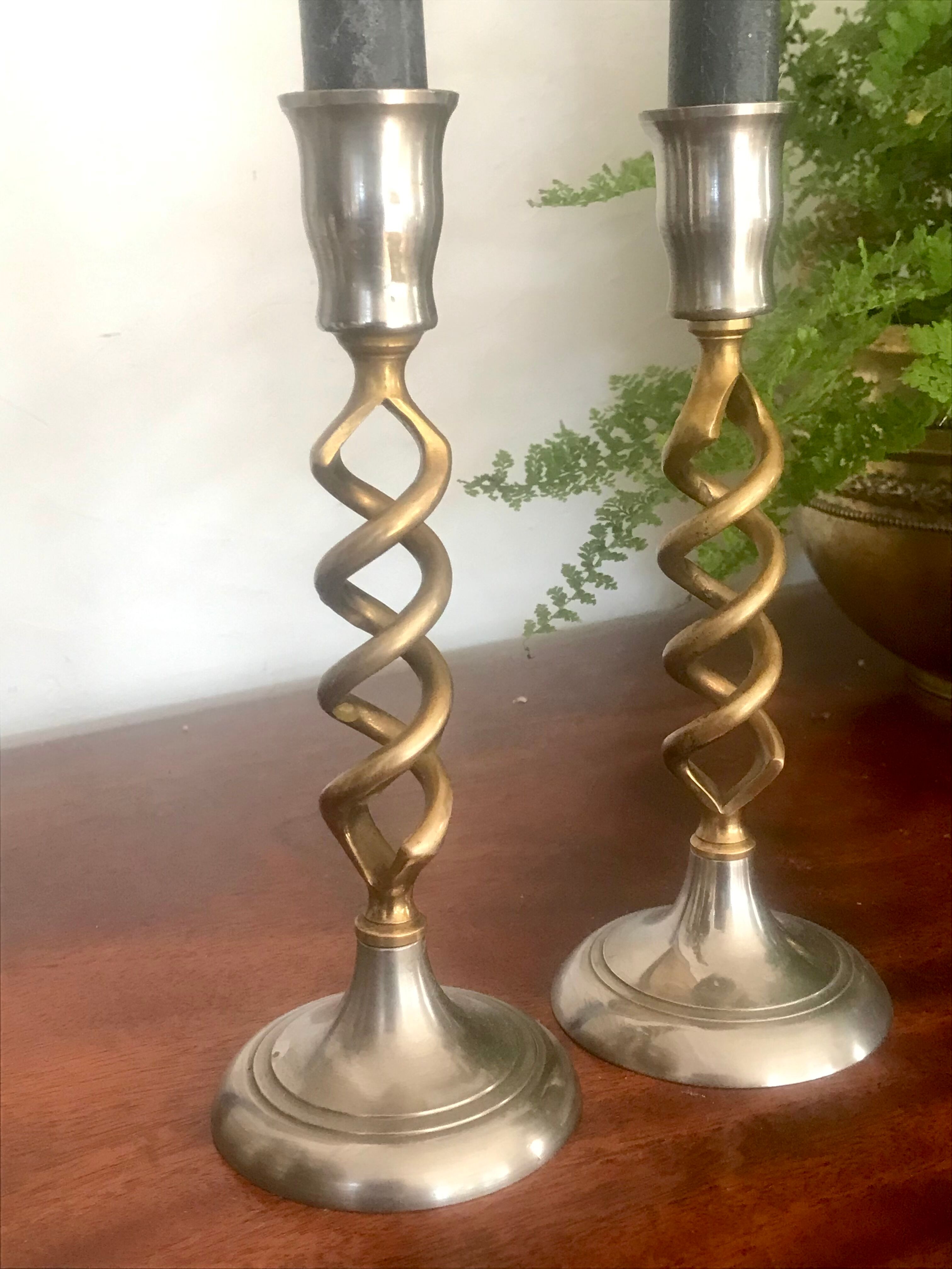Pair of twisted brass candle holders