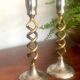 Pair of twisted brass candle holders