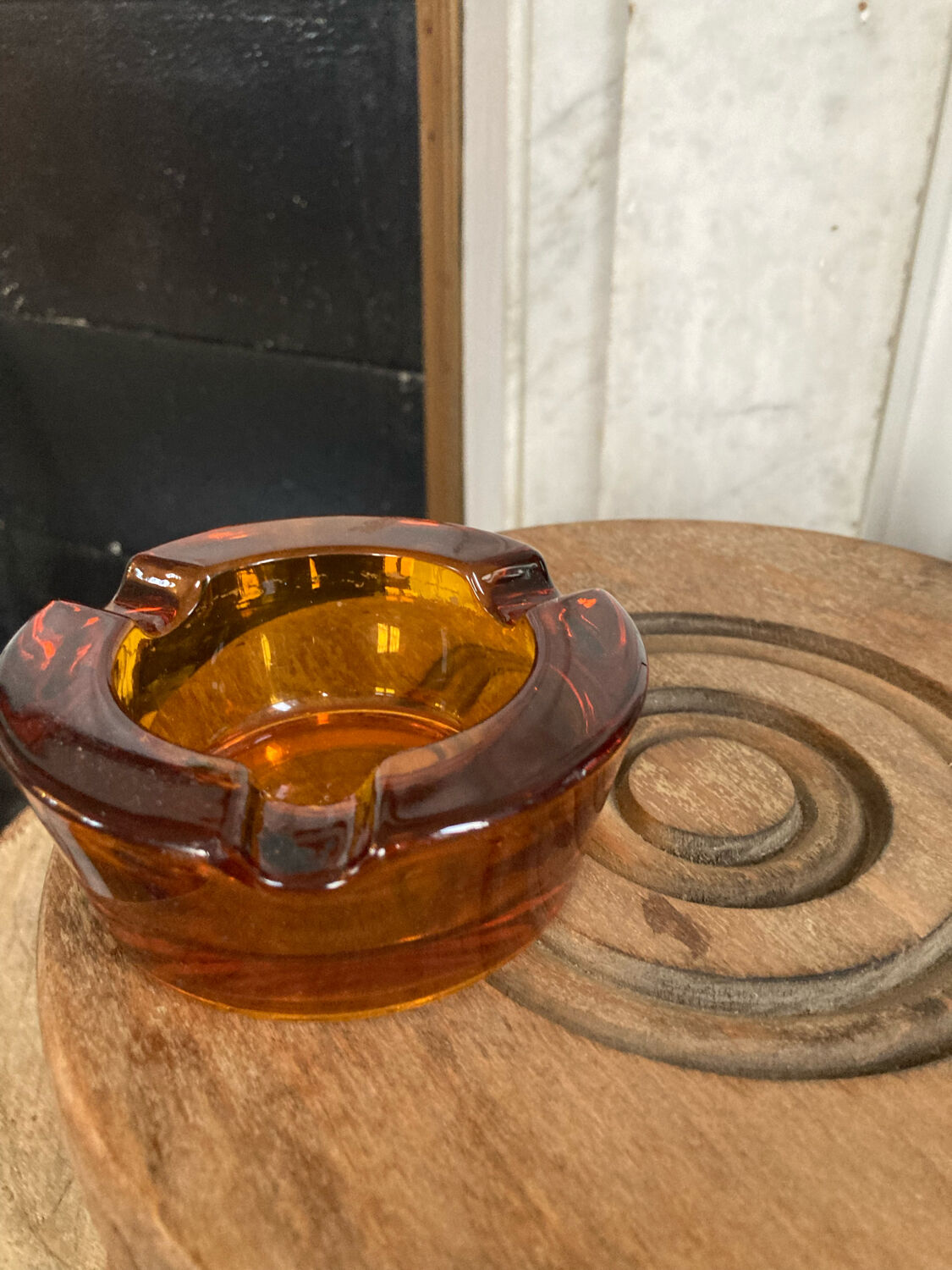 Amber glass ashtray