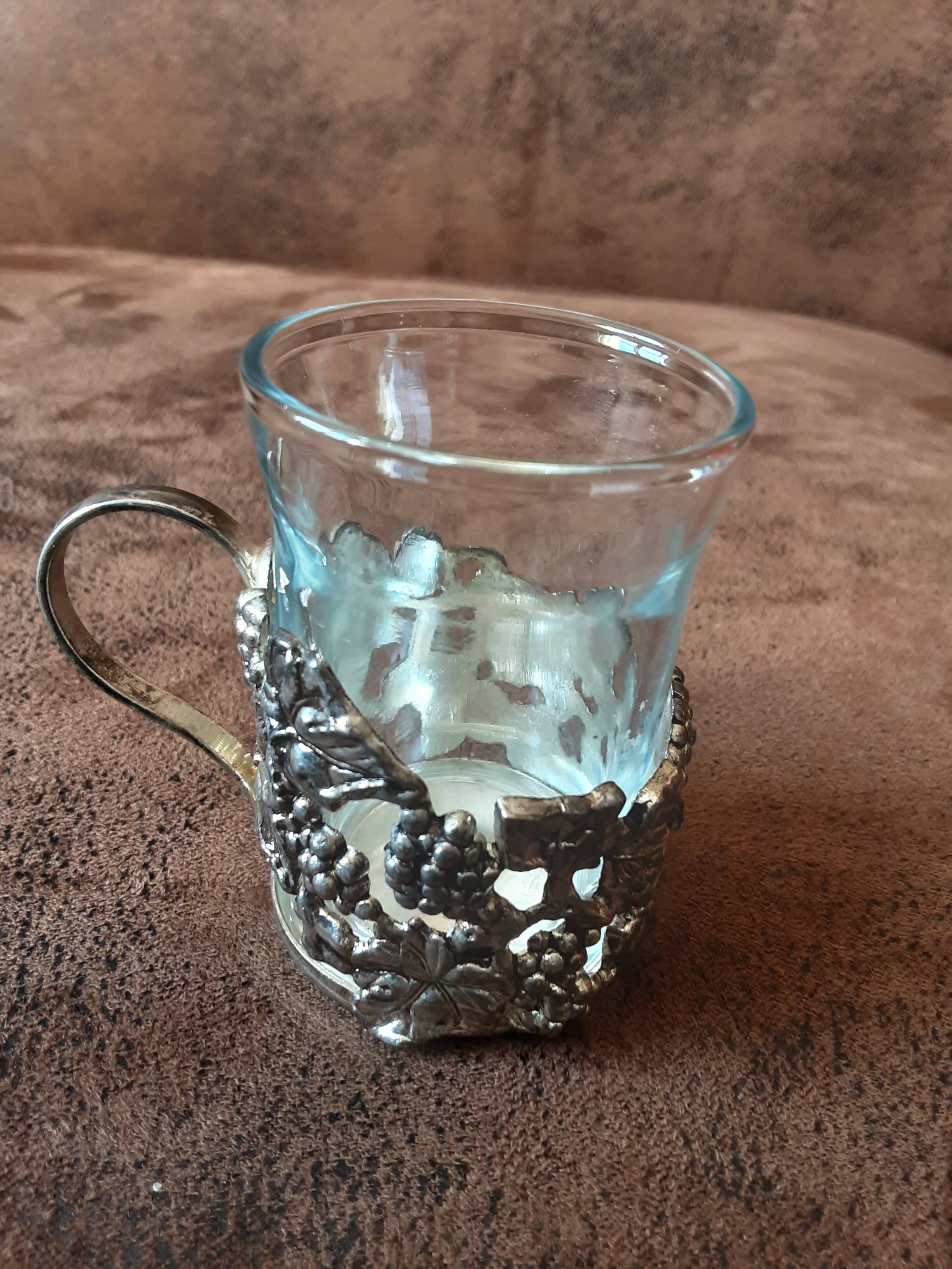 Set of 3 small metal glasses and saucers