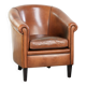 Vintage sheepskin club armchair with a warm colour scheme with black piping