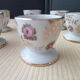Set of 6 flowered shells in Limoges porcelain