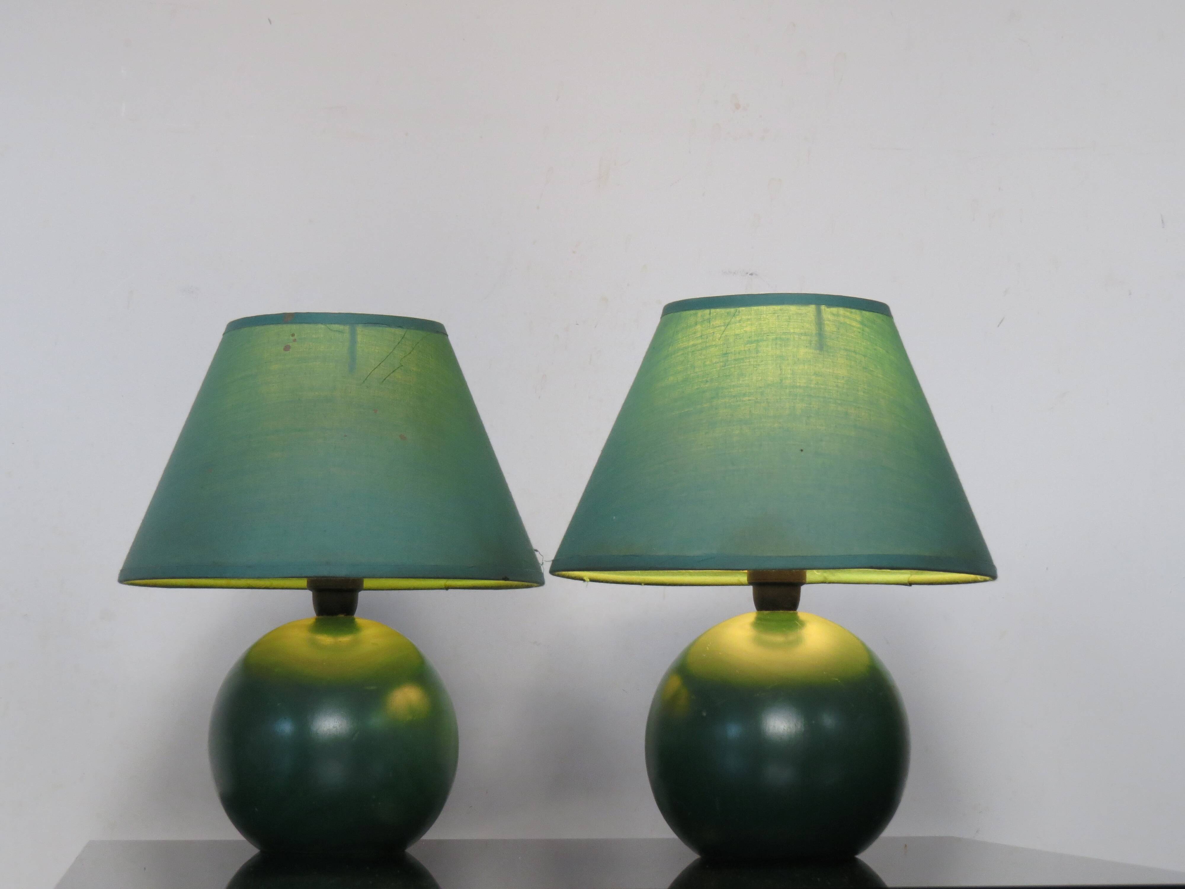 Pair of small green wooden ball lamps