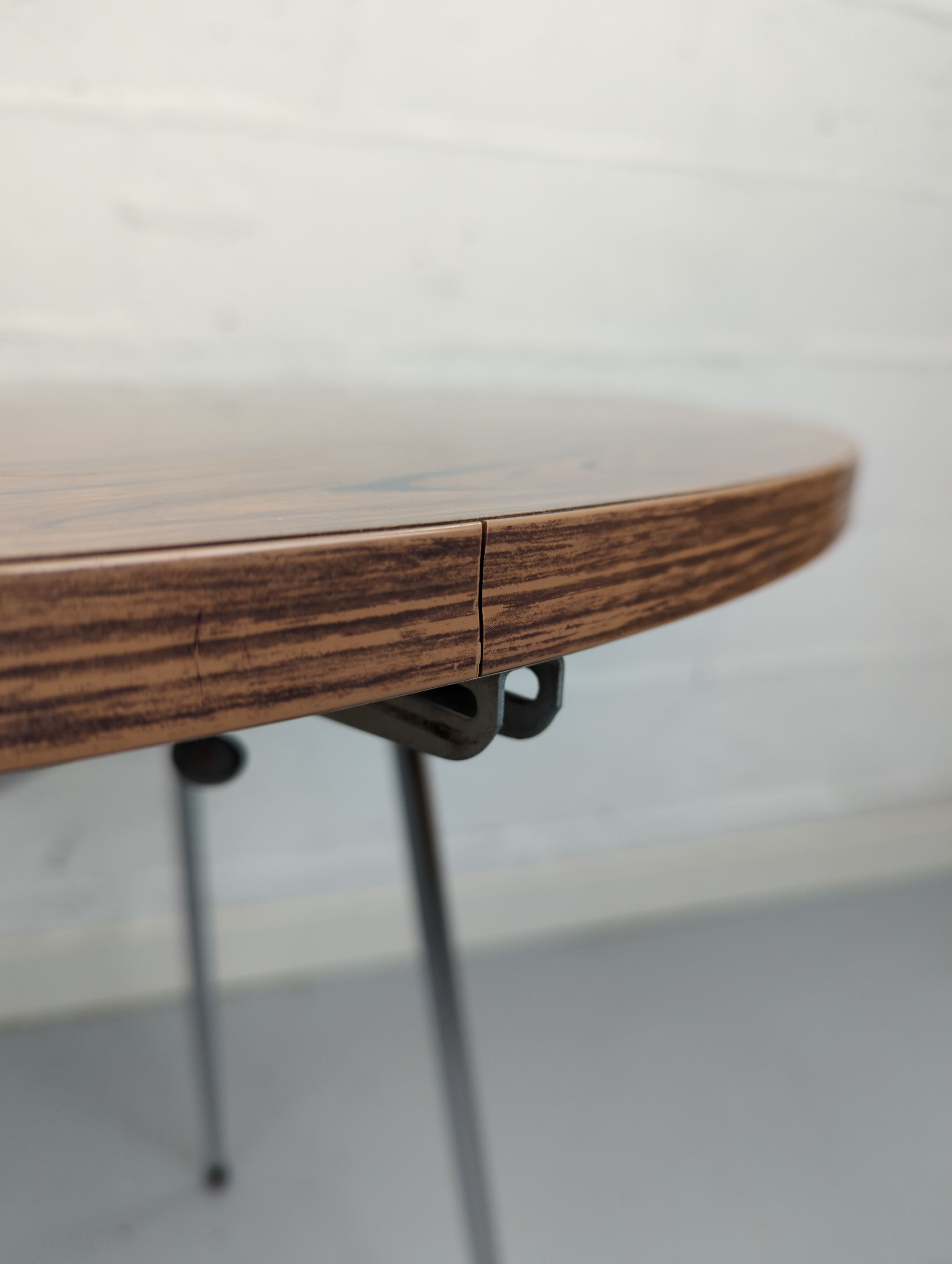 Foldable brown formica table compass legs