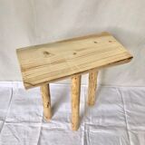 Wooden tripod farm stool