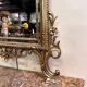 Important console table with a curved shape + Louis XV style mirror in gilded and silvered wood.