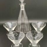 Glassware and bottle set in chiseled glass with flower motif