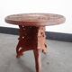 Tabouret de chasse en bois sculpté à décor de vignes