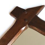 Rectangular mirror with bevelled wooden frame, 1970s.