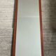 Scandinavian mirror in solid teak from the 60s-70s.
