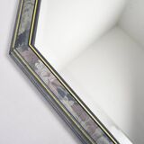 Old octagonal beveled mirror.
