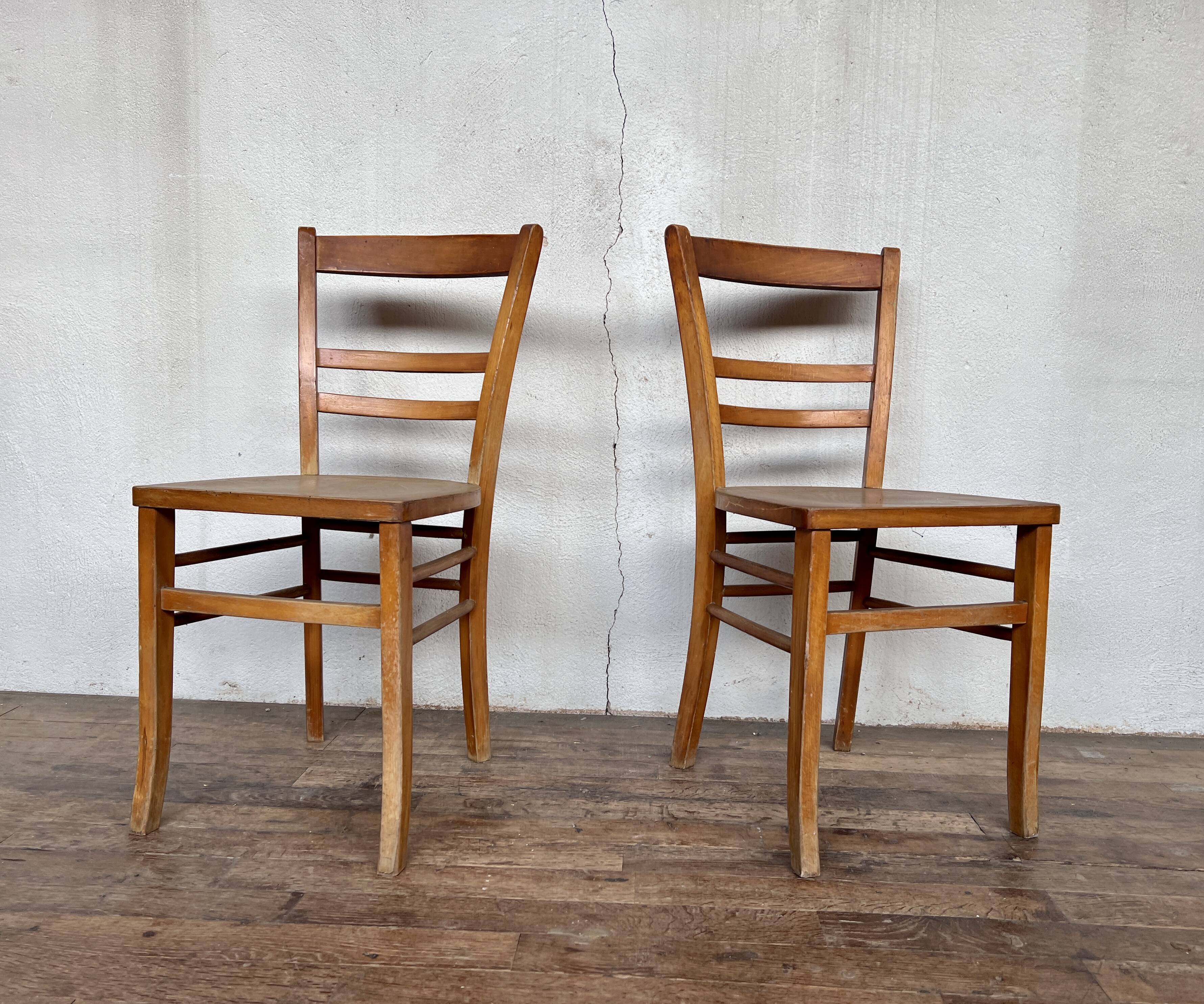 Pair of parisian wooden bistro chairs