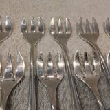 12 silver-plated oyster forks by silversmith J Brille with stick handles.