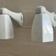 Pair of Art Deco wall sconces in ceramic and opaline.