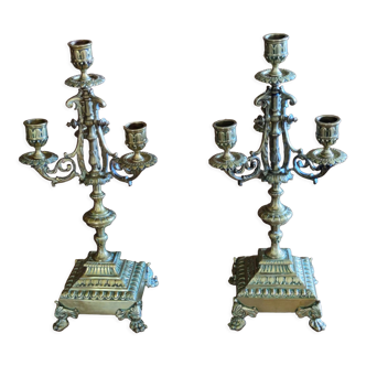 Paire de chandeliers anciens en bronze doré patiné