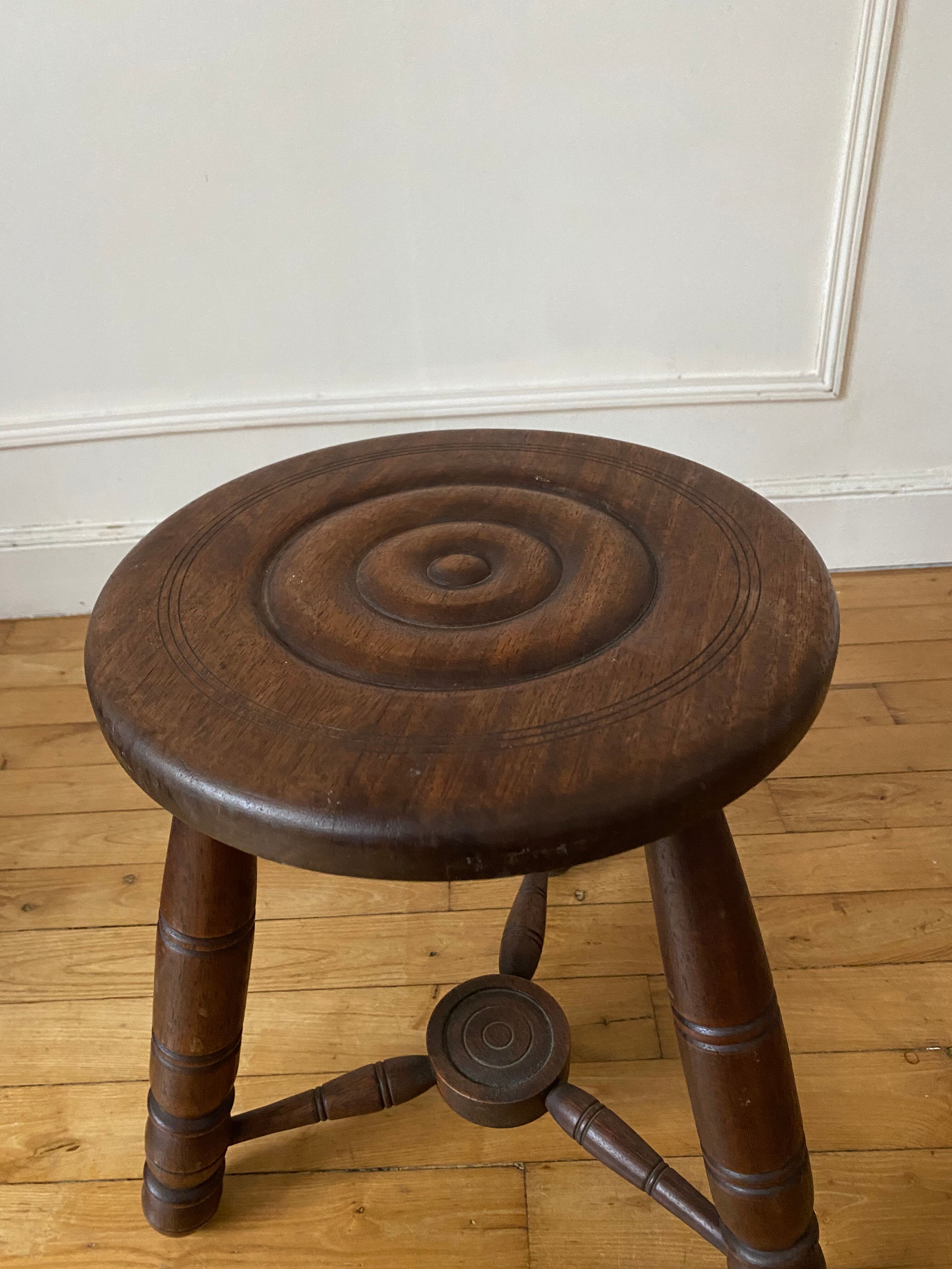 Wooden tripod stool