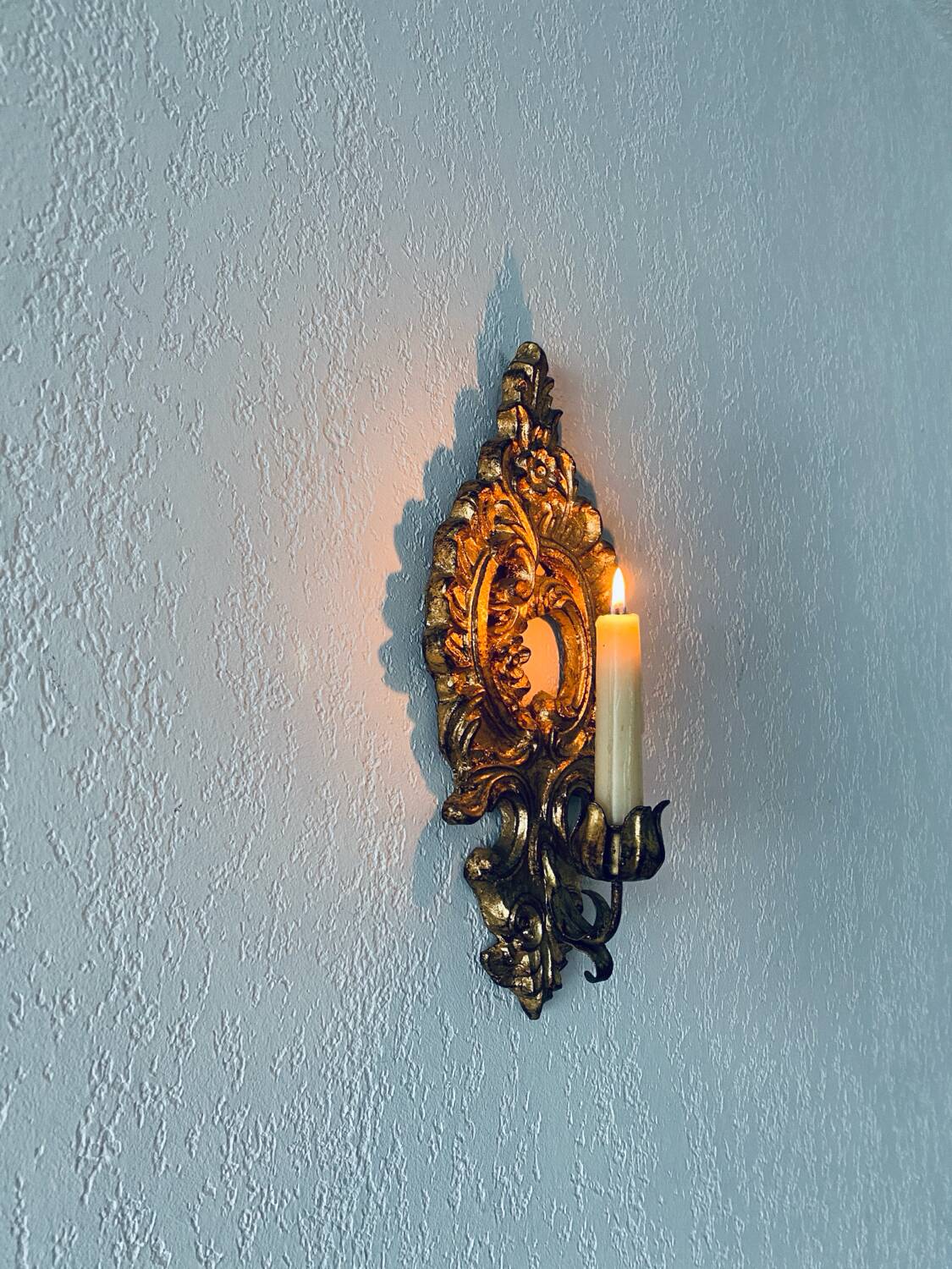 Gold wall candle holder