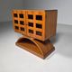 Mid-century modern mobile bar cabinet with sculptural base, 1950s.
