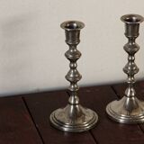 Pair of silver metal candlesticks