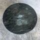 Table basse vintage en marbre noir et laiton