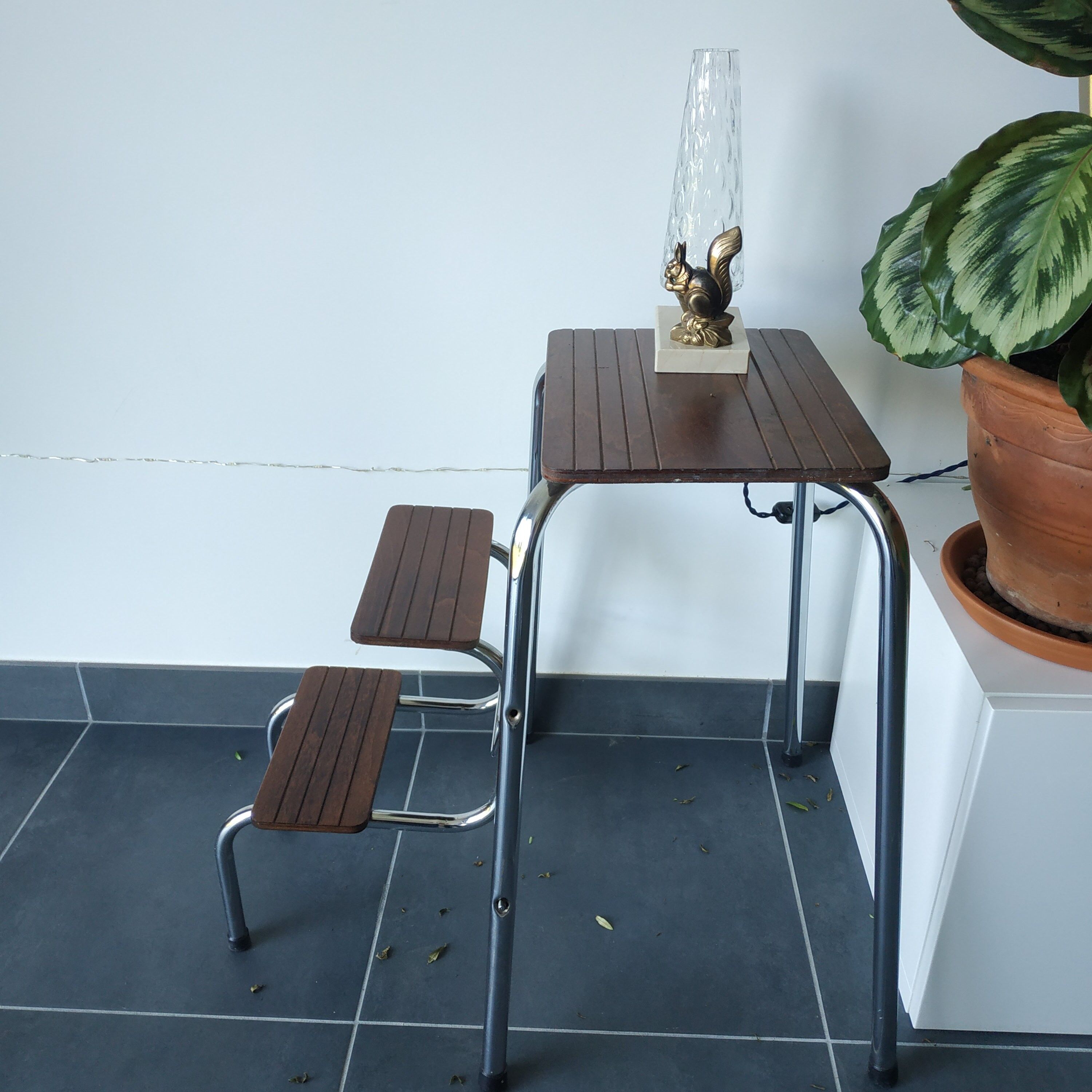 Old retractable wooden stepladder