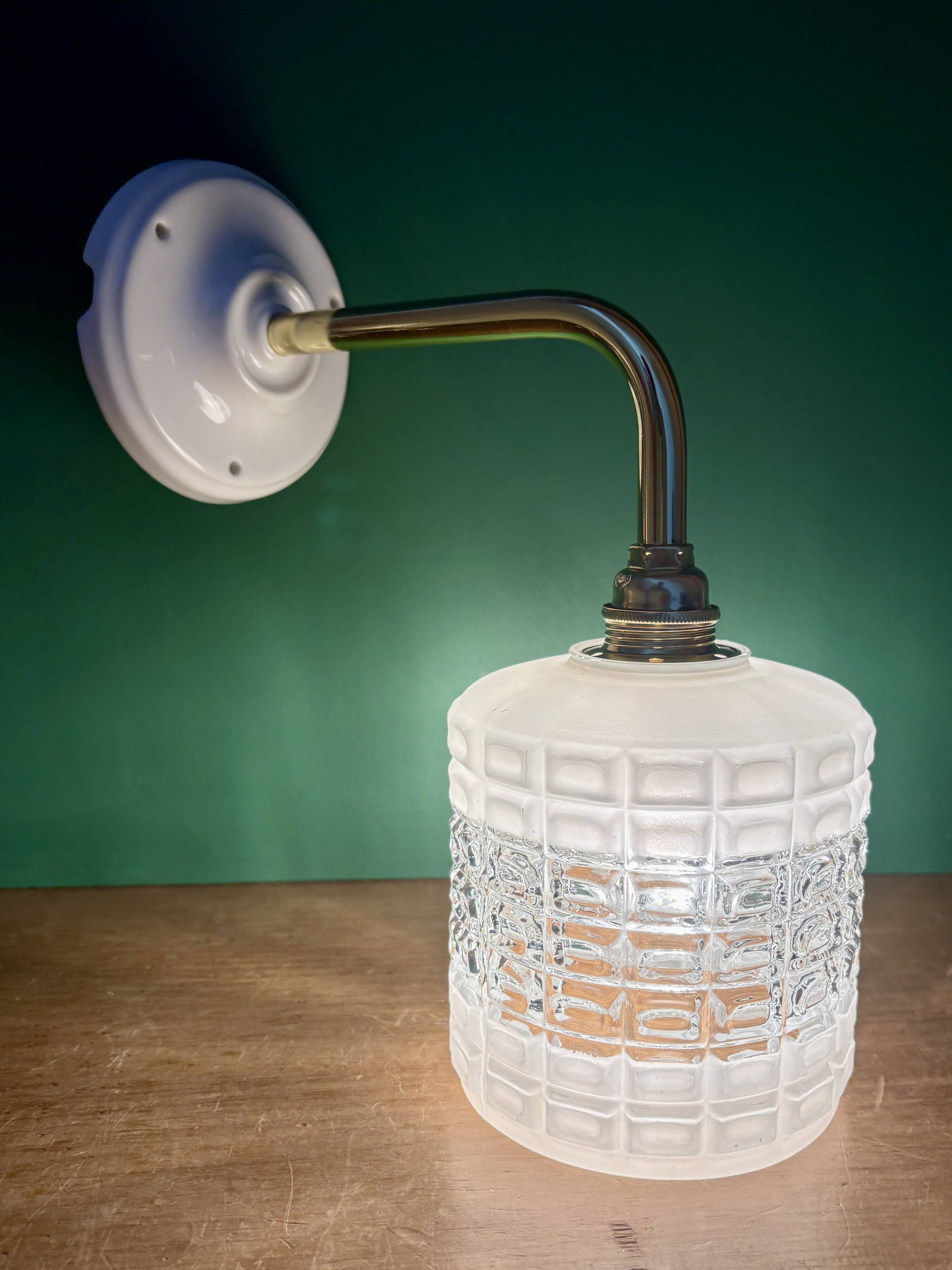 Vintage globe angled wall light in white and clear glass