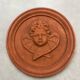 Hanging rondel "Cherub" terracotta