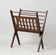 Cross-legged magazine rack cees braakman