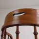 Oak office chair with a spring system and height adjustable, 1930s.