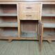 1950s two-body buffet, oak veneer, tapered legs.