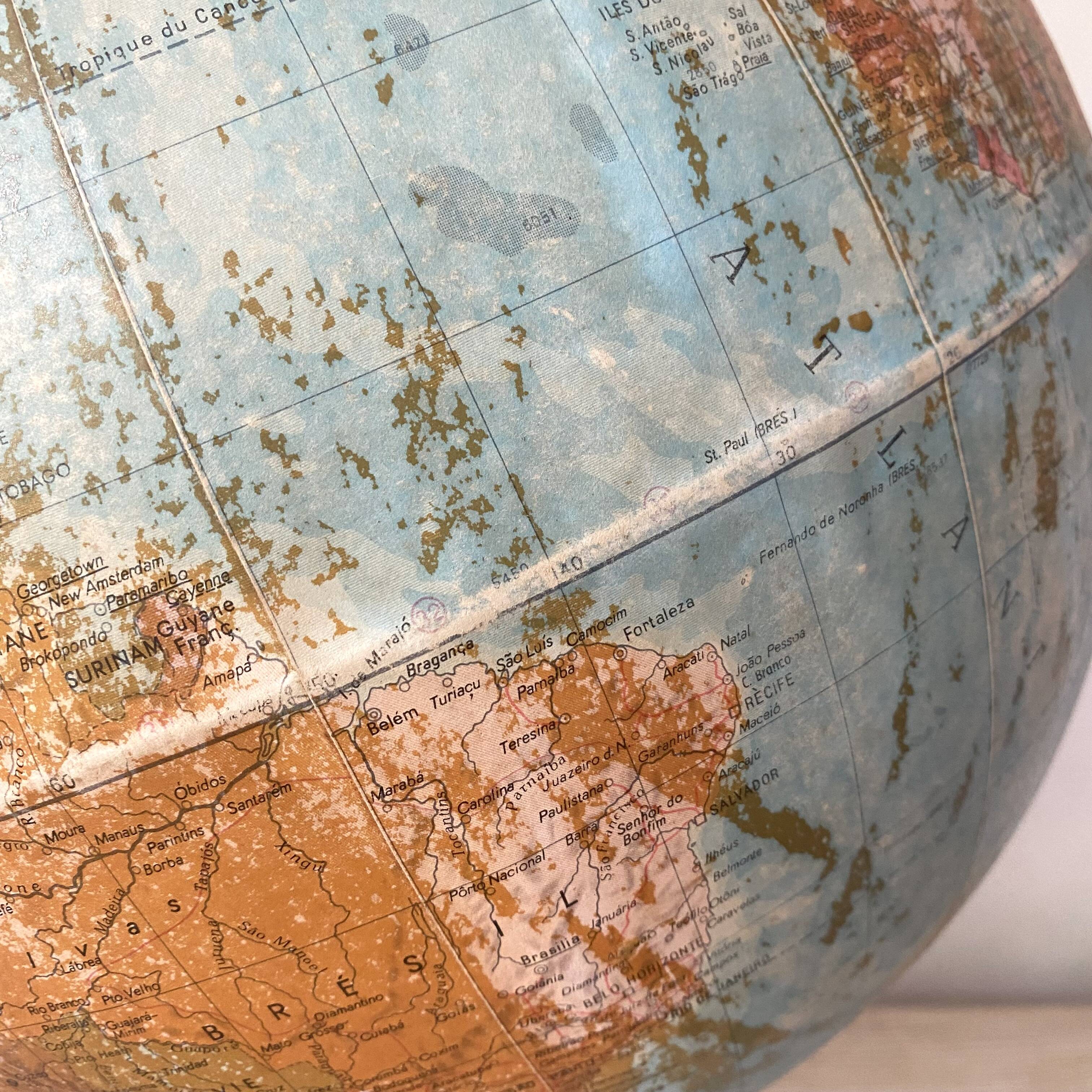 Old terrestrial globe with wooden base H46 cm