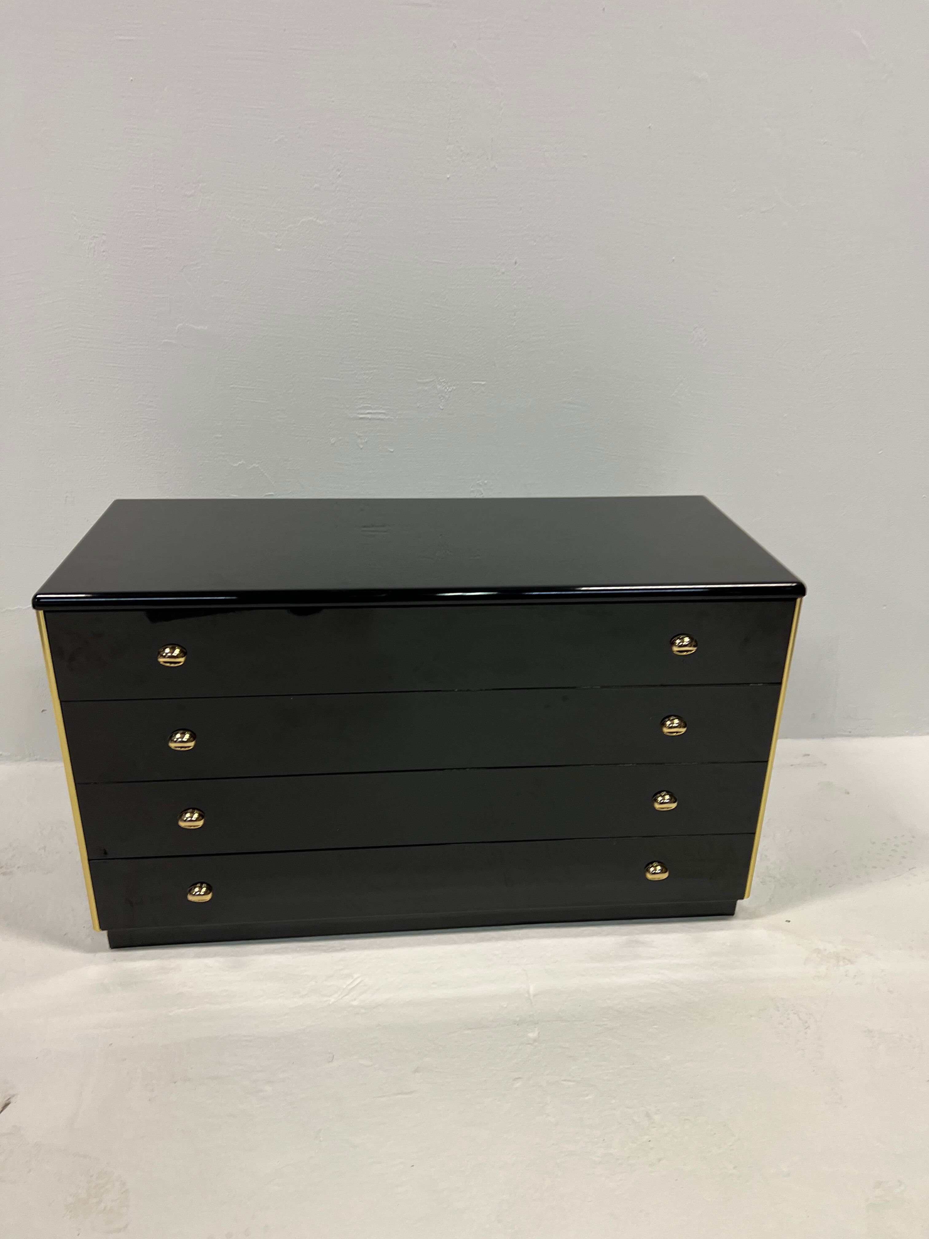 Black lacquered chest of drawers