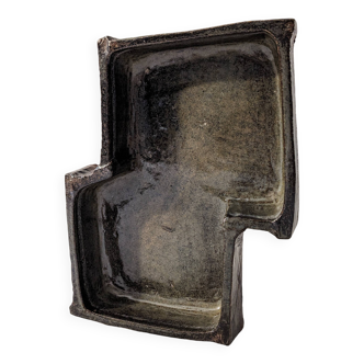 Ceramic pocket emptier